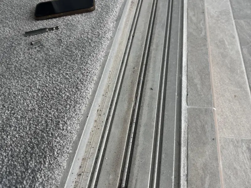 Repairing the track of a sliding door